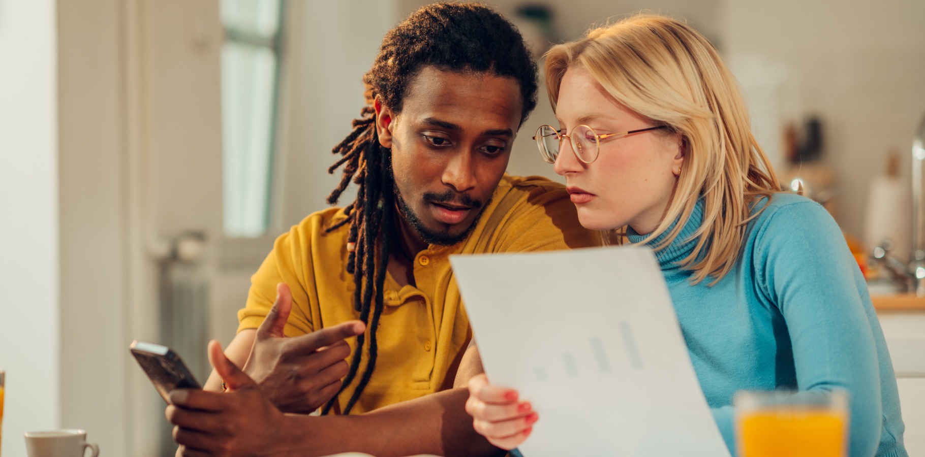 people looking at expense sheet to represent non-deductible expenses