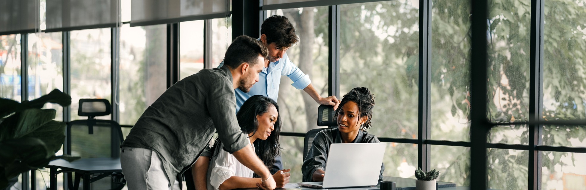 people in an office setting to represent compliance culture